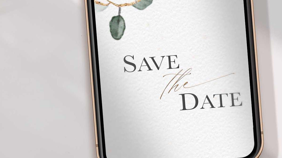 mobile phone with save the date written with elegant font