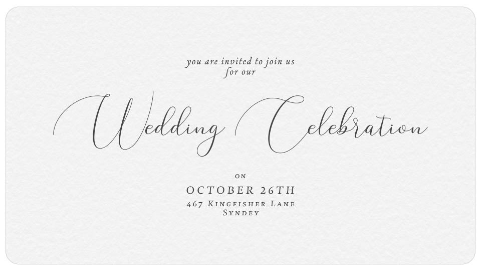 decorative handwritten font on wedding card paper. The writing says wedding celebration