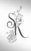 Black and White wedding initials with floral background design.