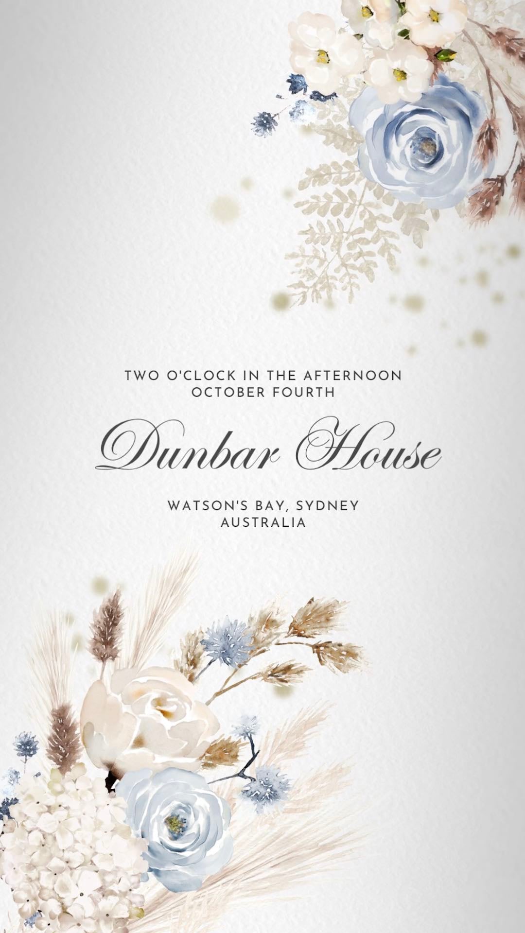Wedding invitation details surrounded y blue boho florals and pampas grass.