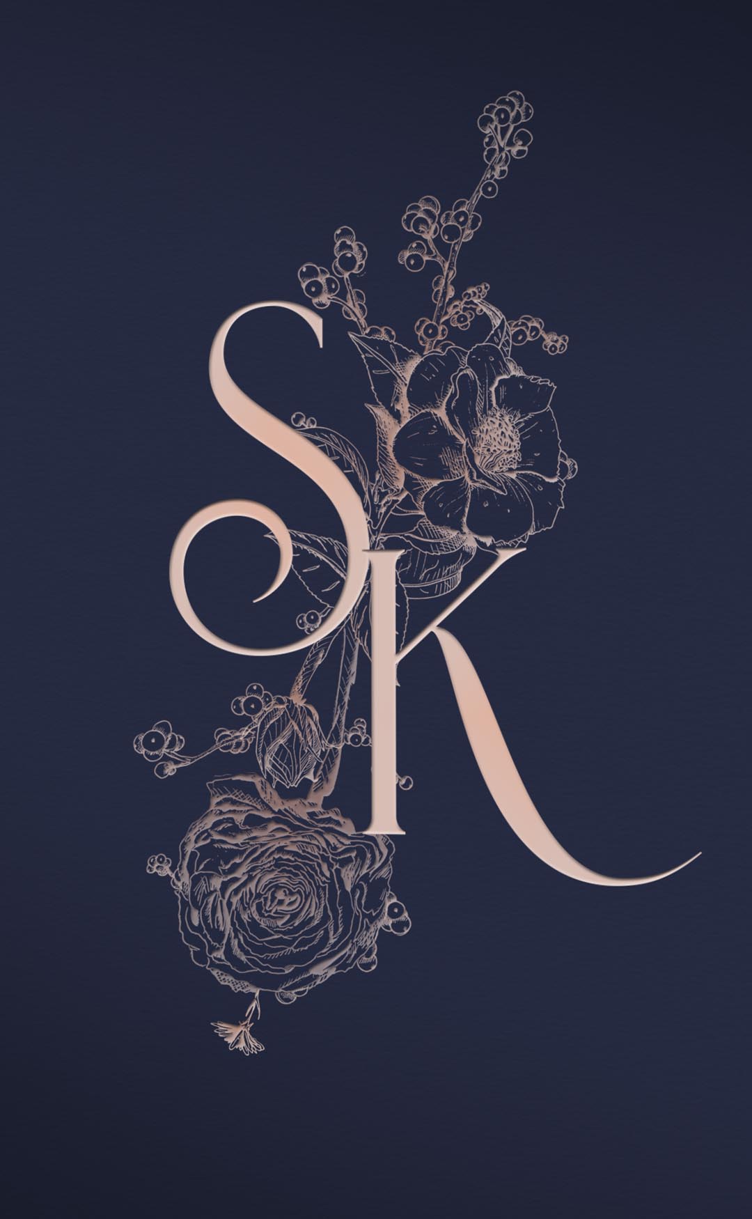 Beautiful pink wedding monogram with pink floral illustrations over a navy background. 